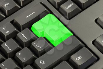Royalty Free Photo of a Keyboard With a Highlighted Enter Button