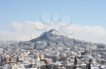 Royalty Free Photo of a Lycabettus Hill During a Winter Blizzard