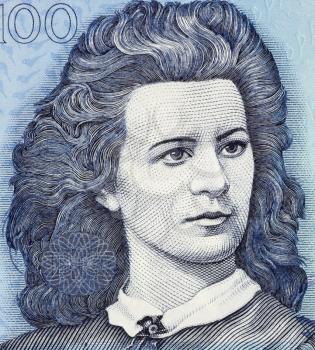 Royalty Free Photo of Lydia Koidula (1843-1886) on 100 Krooni 1999 Banknote from Estonia. Estonian  poet.