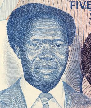 Royalty Free Photo of Milton Obote (1925-2005) on 500 Shillings 1983 Banknote from Uganda. Political leader who led Uganda towards independence from the British colonial administration in 1962. He bec