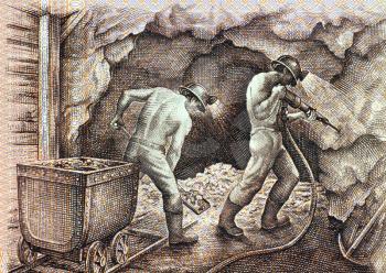 Royalty Free Photo of Miners on 5000 soles de oro 1985 banknote from Peru