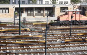 Royalty Free Photo of Railway Tracks and Depot with Train in Athens, Greece