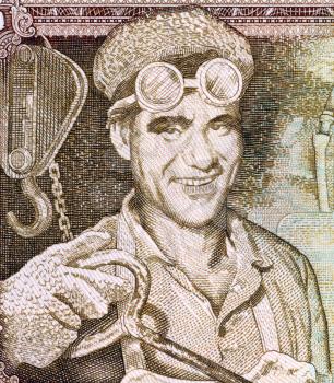 Royalty Free Photo of a Steel Worker on 10 Dinars 1968 Banknote from Yugoslavia