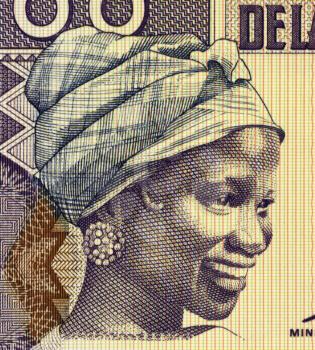 Royalty Free Photo of a Young Woman on 100 Francs 1998 Banknote from Guinea.