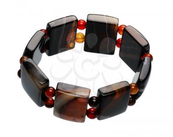 Bracelet, made of brown polished stones, isolated on a white background