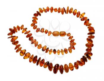 A necklace of pieces of brown amber, isolated on a white background.