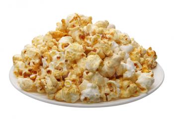 Popcorn on a white plate, isolated on a white background