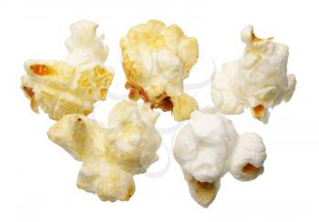 Few grains of popcorn, isolated on a white background