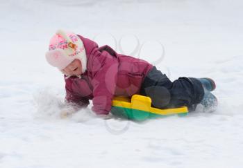 Royalty Free Photo of a Child With a Sled