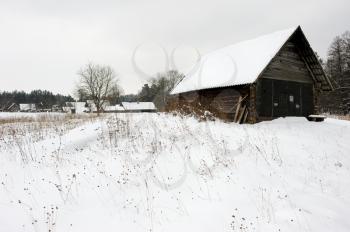 Royalty Free Photo of a Snowy Village and Field
