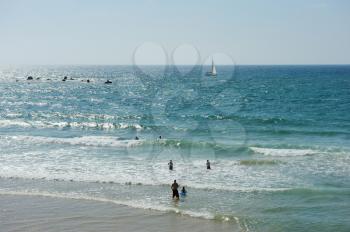 Royalty Free Photo of an Ocean With People Swimming