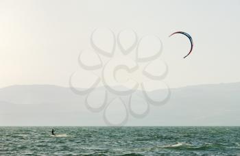 Royalty Free Photo of Sky-Surfing in the Rays of the Setting Sun on Lake Kinneret