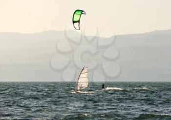 Royalty Free Photo of a Sky Surfer and Wind Surfer