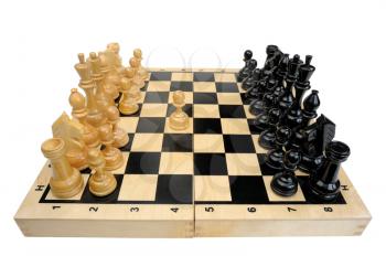 Royalty Free Photo of a Chess Board With Wooden Pieces Lined Up