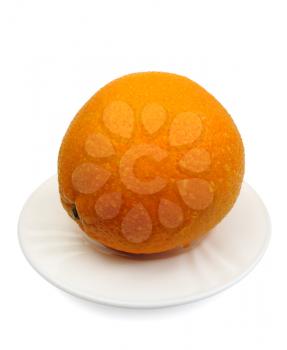 Royalty Free Photo of an Orange on a White Plate