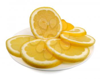 Cut lemon on a white plate on a white background, isolated