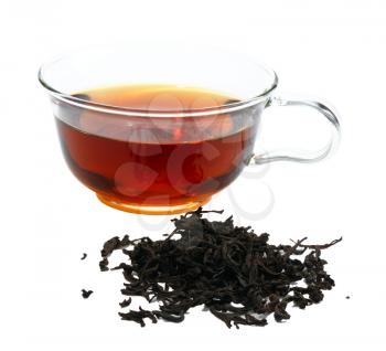 Royalty Free Photo of Black Tea Leaves and a Cup of Tea