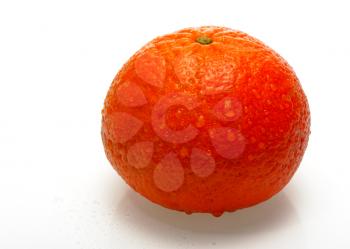 Mandarin with drops of water on a white background, isolated