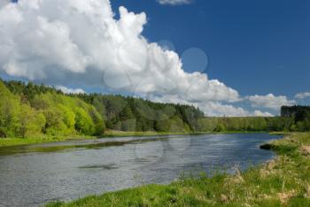 Royalty Free Photo of a River Scene With Clouds in the Sky