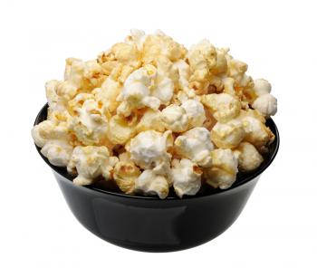 Popcorn in a black cup, isolated on a white background
