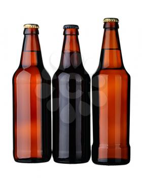 Bottles of lager and dark beer from brown glass, isolated on a white background.
