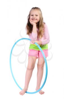 Girl with long blond hair, with  hula hoop, isolated on a white background.