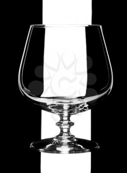glass goblet, isolated on a blaack background.