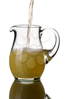 Glass pitcher, isolated on a white background.