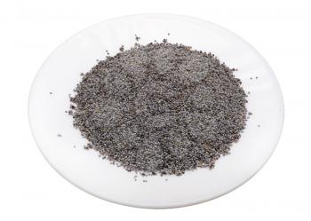Poppy seeds on a white plate, isolated