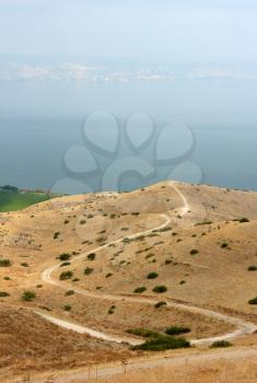 Shore of Lake Kinneret, the slopes of the Golan Heights in Israel