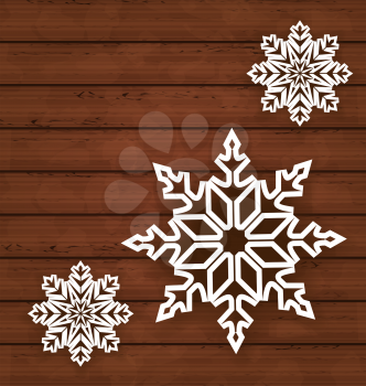 Illustration set snowflakes on wooden background - vector