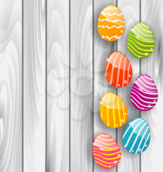 Illustration Easter glossy colorful eggs on grey wooden texture - vector