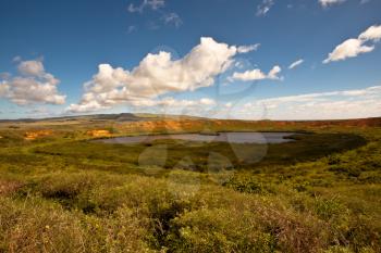 Royalty Free Photo of a Volcano Crater and Small Lake on Easter Island