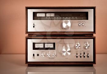 Royalty Free Photo of a Vintage Stereo and Tuner in a Wooden Cabinet