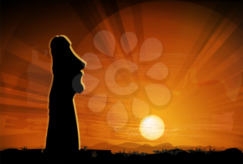 Royalty Free Clipart Image of an Easter Island Statue at Sunrise
