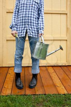 Royalty Free Photo of a Person With Gardening Tools