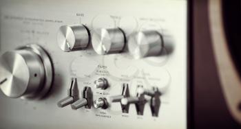 Vintage Stereo Audio Amplifier Front Panel Volume Knob Closeup