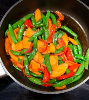 Colorful Healthy Vegan Food in the Pan closeup