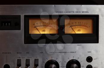 Vintage stereo cassette tape deck player recorder VU meters closeup