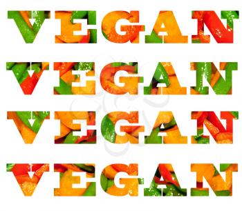 Vegan text made of vegetable food on white
