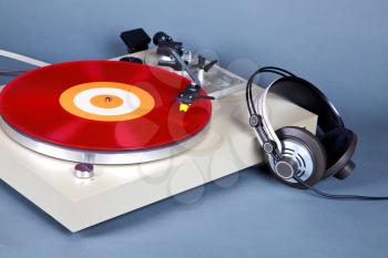 Analog Stereo Turntable Vinyl Record Player with Red Disk and Headphones