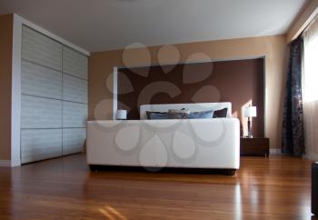 Modern contemporary apartment bedroom interior design after bamboo floors renovation angled view