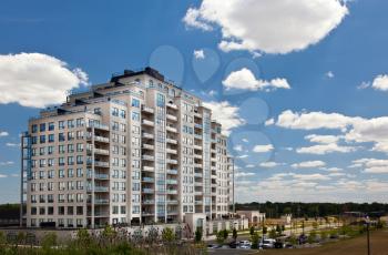 Modern residential high rise building subdivision neighbourhood blue sky perspective view