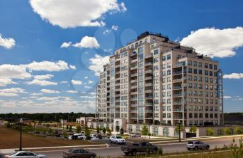 Modern residential high rise building subdivision neighbourhood blue sky perspective view
