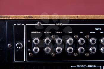 Vintage Stereo Amplifier Black Rear Panel Terminals in Row Closeup 