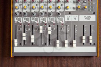 Audio studio sound mixer equalizer board sliders, faders and knobs, top view 
