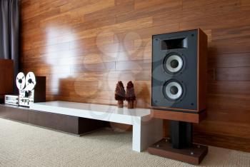 Vintage audio system in minimalistic modern interior, diagonal perspective view
