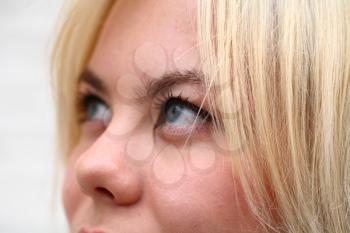 closeup of face - Beautiful young blonde female posing for camera
