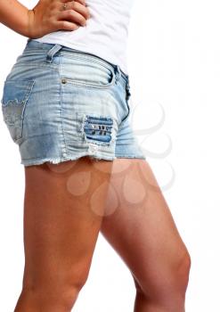 girl in jeans shorts over neutral background