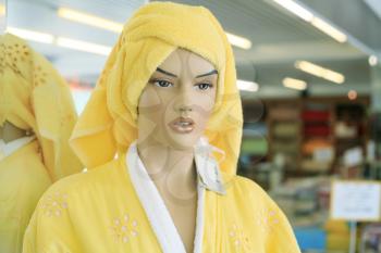 in the  store - mannequin weared yellow bath clothes